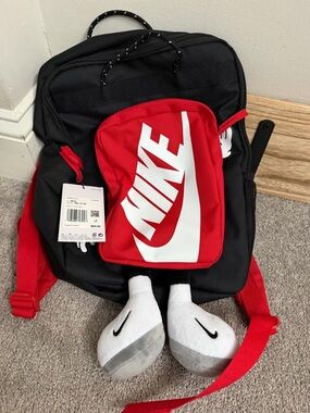 Nike Red and Black Backpack with Bold Swoosh